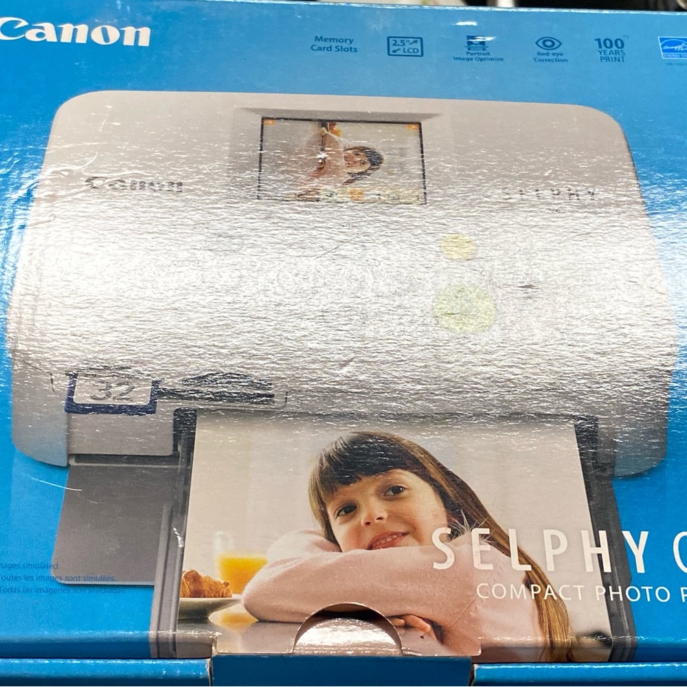 Cannon selphy picture printer with paper and ink
